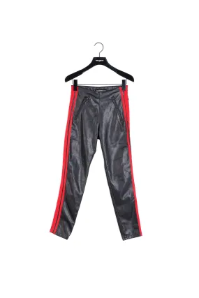 Jean slim noir effet cuir bande côté